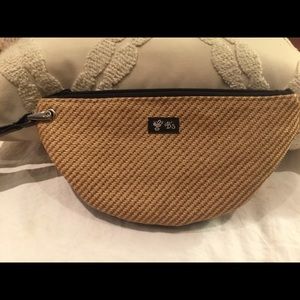 B’s Straw wristlet with black patent leather trim.